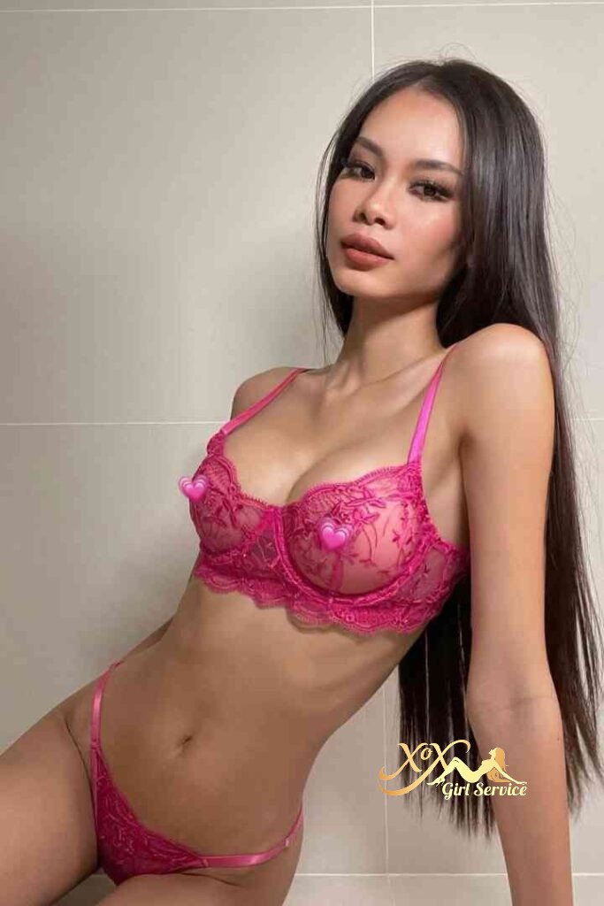 Seductive Thai escort Sasa in pink lingerie. Incall outcall services.